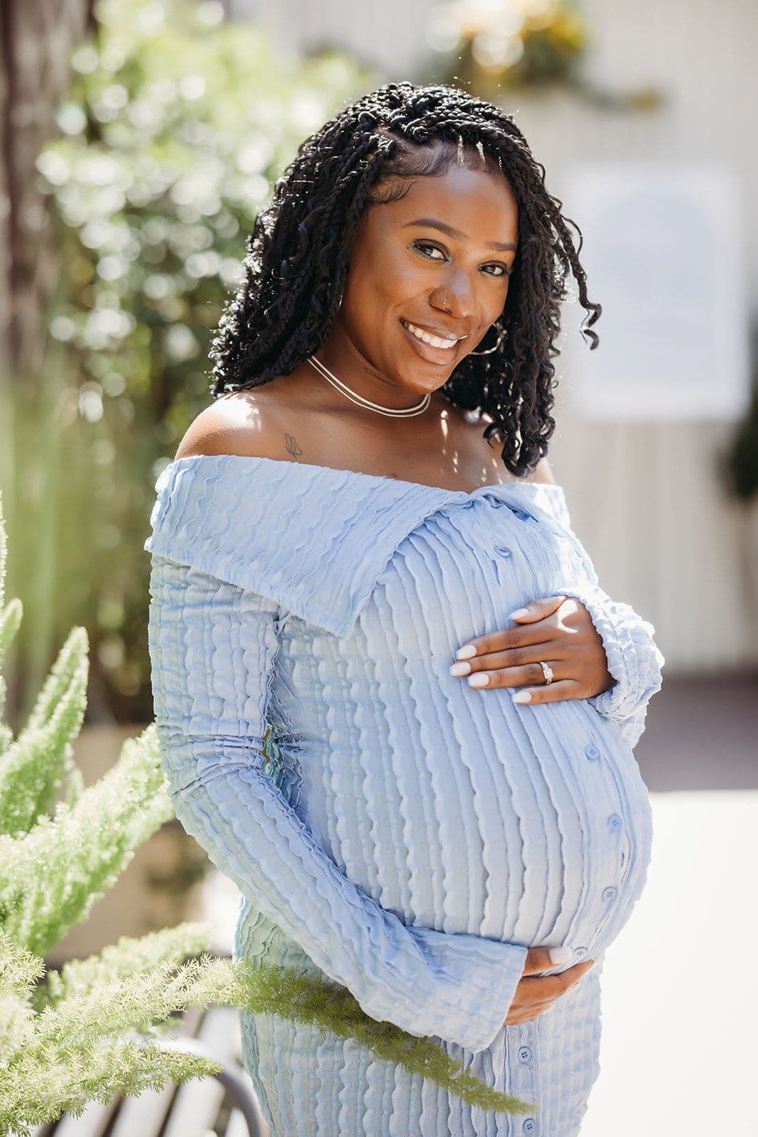 Detail of bridal shower table setting with candles at Gather Walnut Creek.